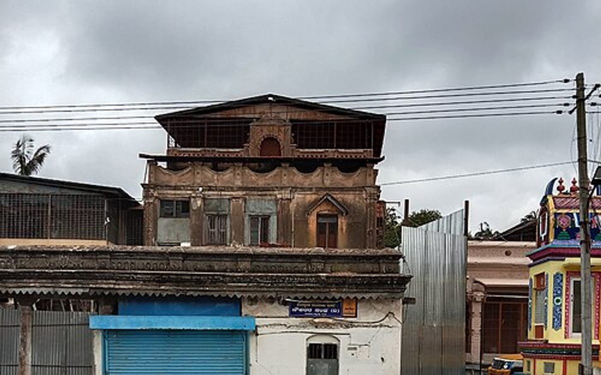 The Government Sanskrit College at Melukote, an old tiled building on the town street.